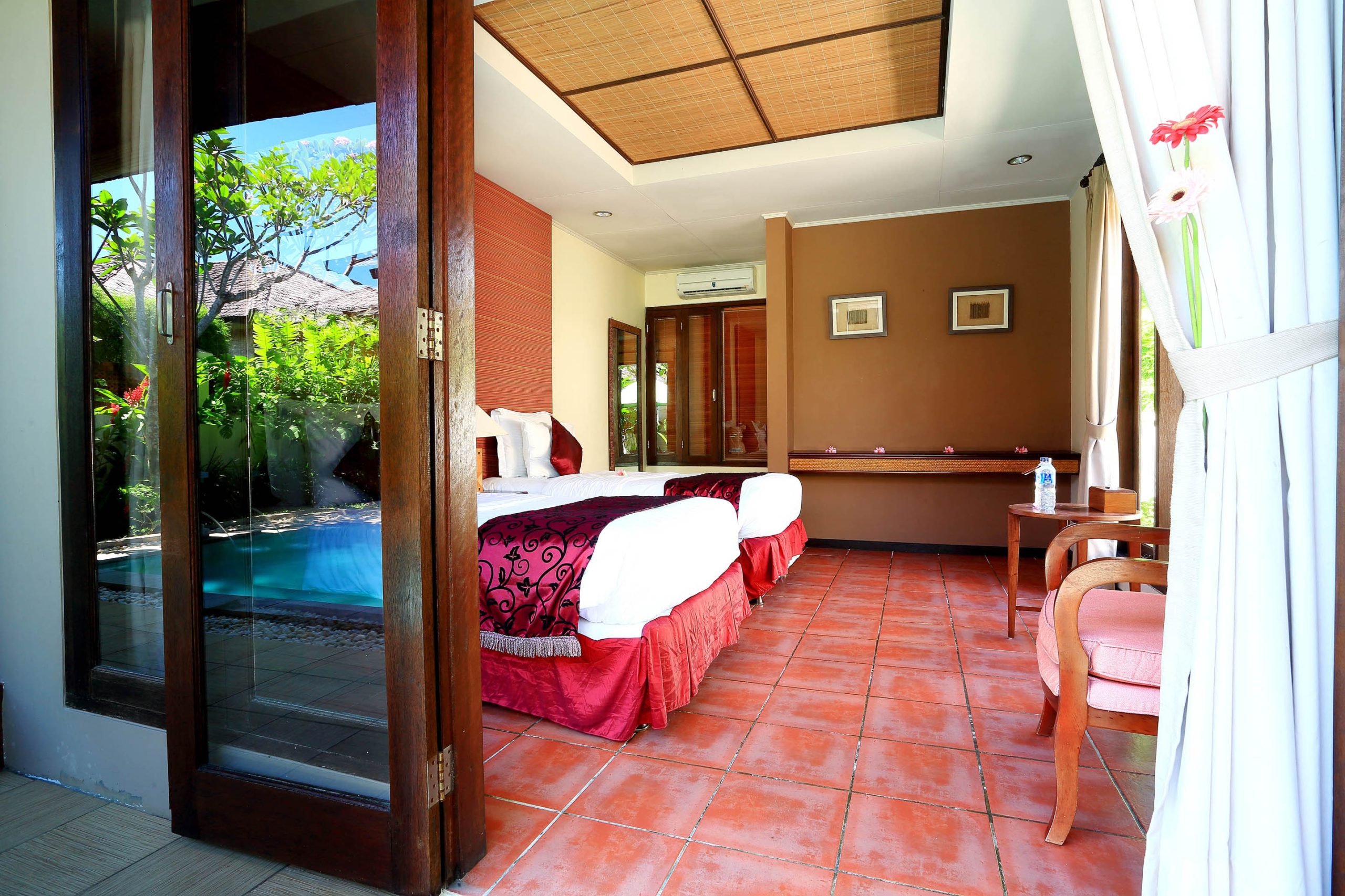 Villa bedroom with pool view